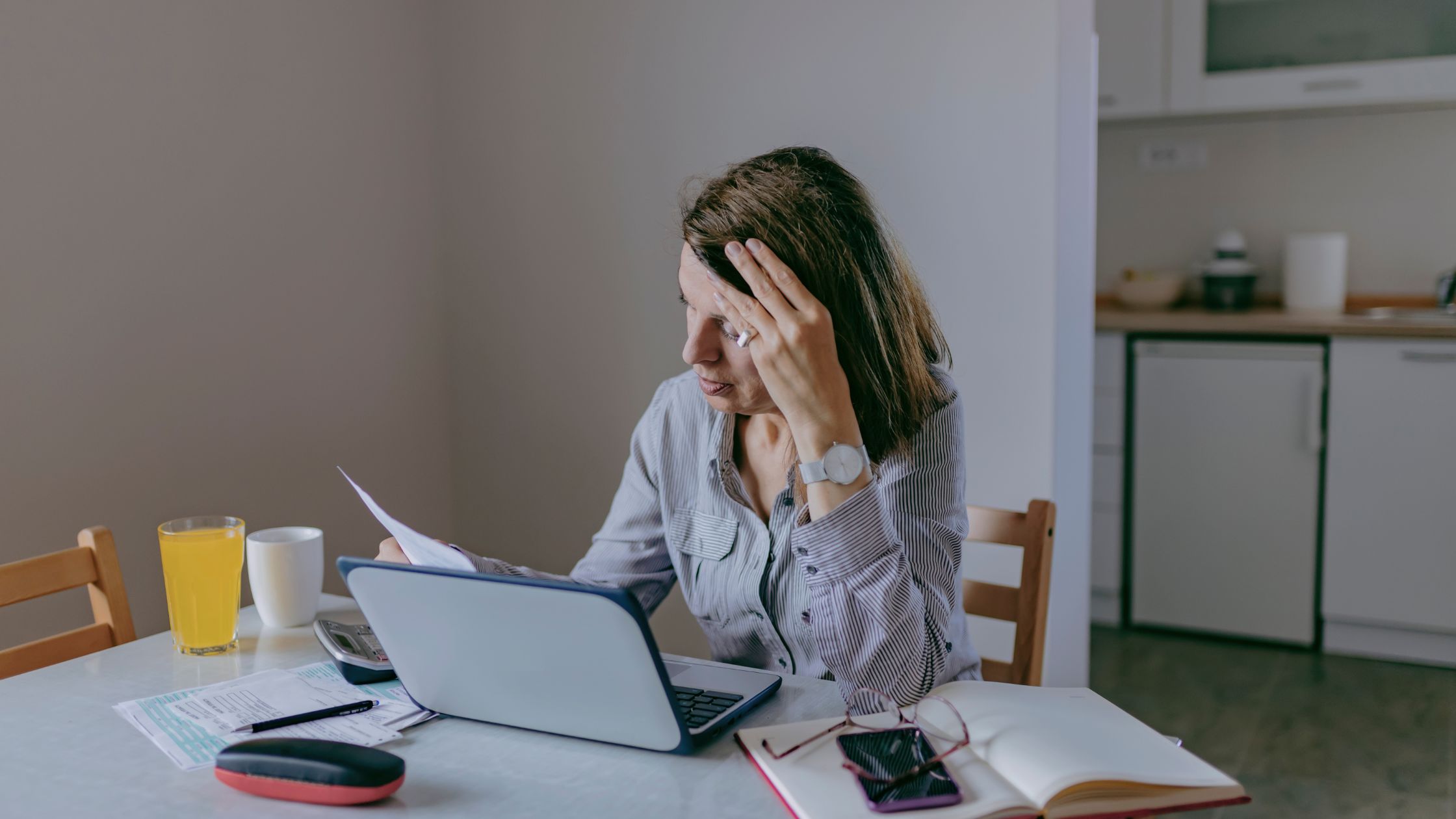 woman facing tax levy, upset